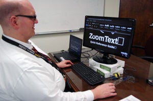 Person using ZoomText magnifier on a computer screen