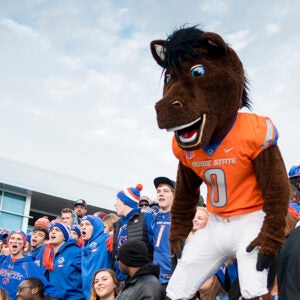 Buster Bronco and the crowd at the Boise State football game versus Wyoming