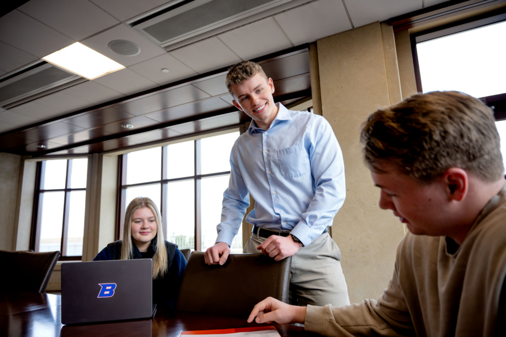 Nick Lloyd in a meeting with fellow students.