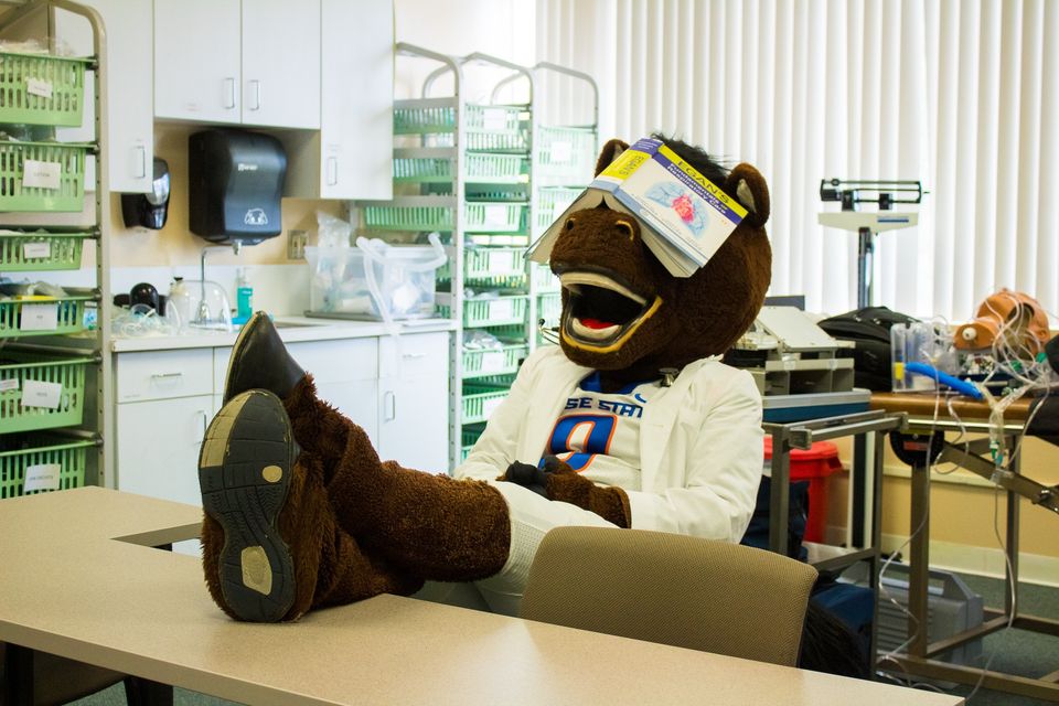 Buster Bronco with Book on his head