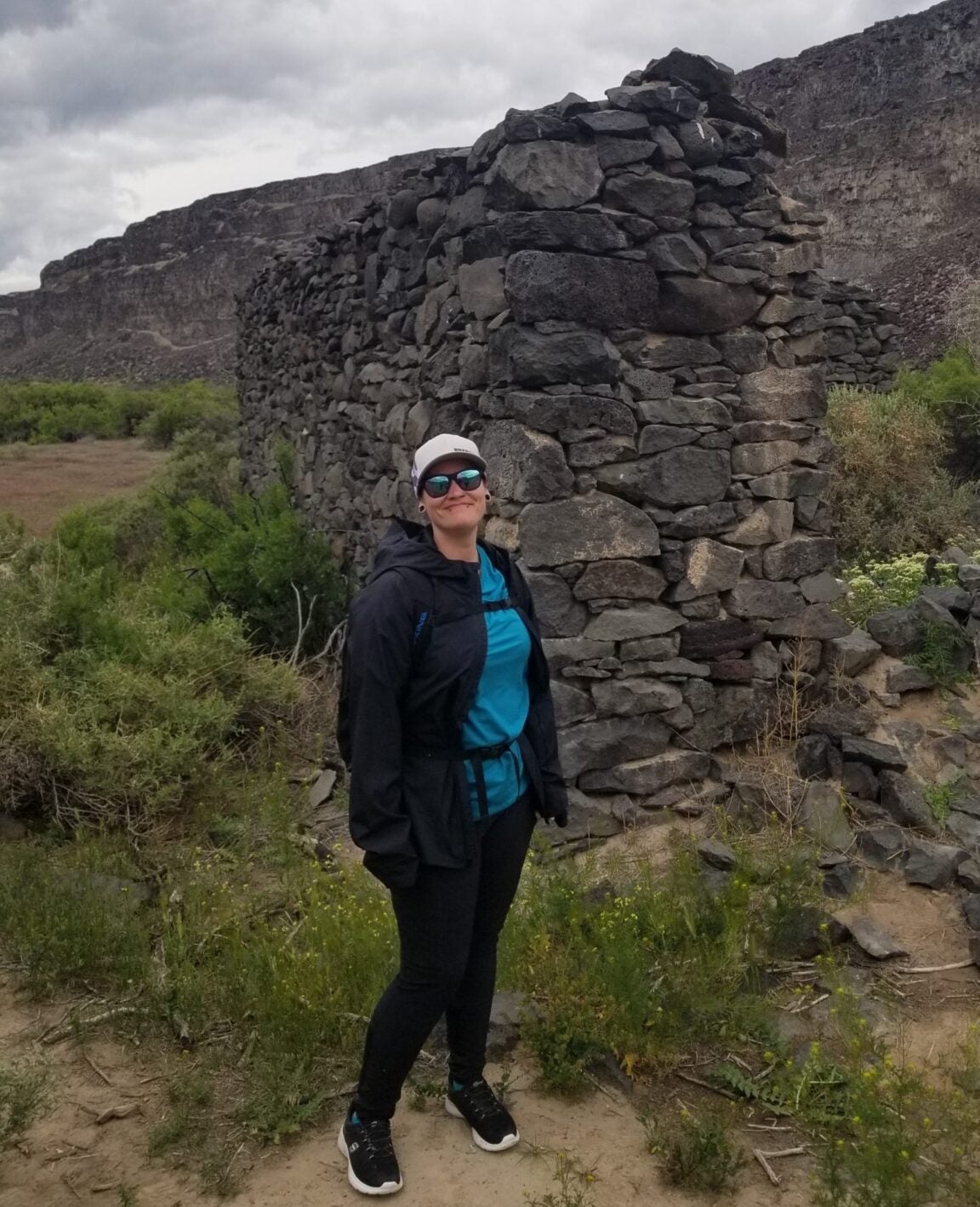 Jolene hiking with a backpack on