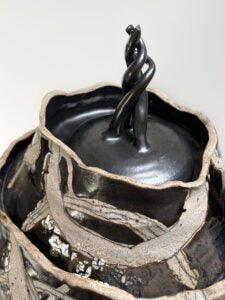 Ceramic vessel with a dark glaze