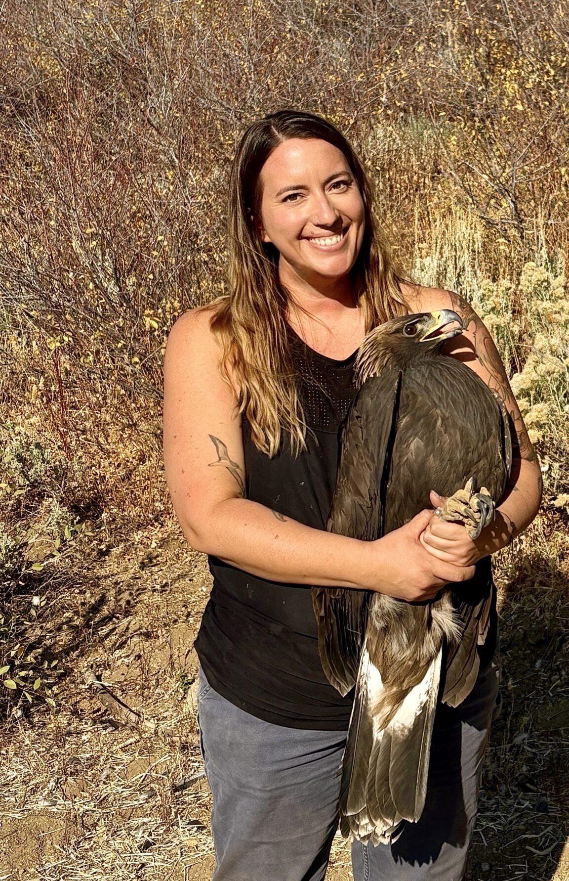 Eden holding a golden eagle