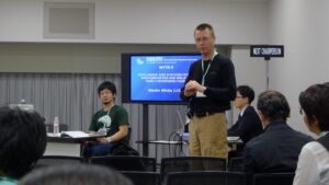 Dr. Merlin White conducts a symposium at IUMS in Sapporo, Japan.