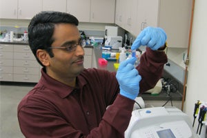 Rajesh Nagarajan working in a lab