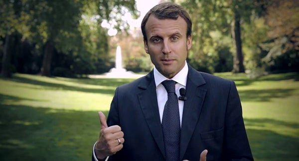Photo of Emanuel Macron standing outdoors