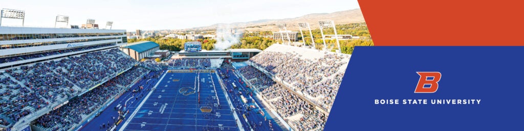 Image of Boise State stadium with crowds in the stands and they foothills in the background. On the right side are orange and blue angles with the university logo in the lower right corner.