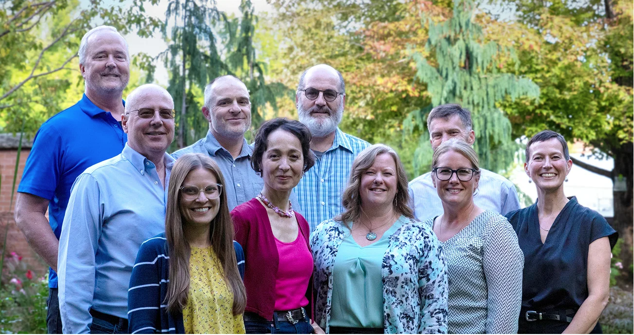 The National Institute of Health, Center of Biomedical Research Excellence in Convergent Engineering and Biomolecular Science at Boise State University team. Front row: Erin Mannen, Karen Marker, Rhiannon Wood, Tracy Yarnell and Diane Smith. Back row: Jim Browning, Tyler Brown, Stephen Crowley and Paul Davis. Top left: Ken Cornell. Missing from photo: Benjamin Johnson.