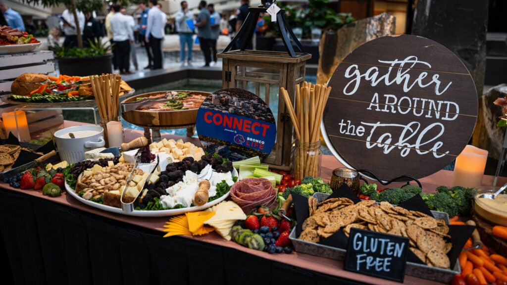 Food table with event branding for Connect.