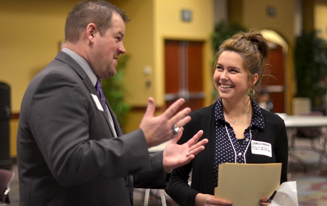 Student talking to employer at Career Fair