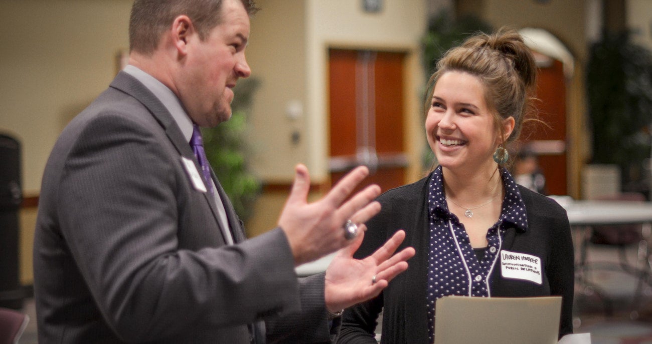 Student talking to employer at Career Fair