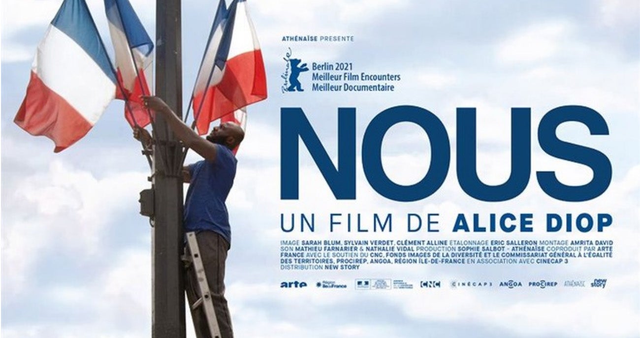 Poster for Diop's documentary Nous showing a man on a ladder installing French flags on a pole