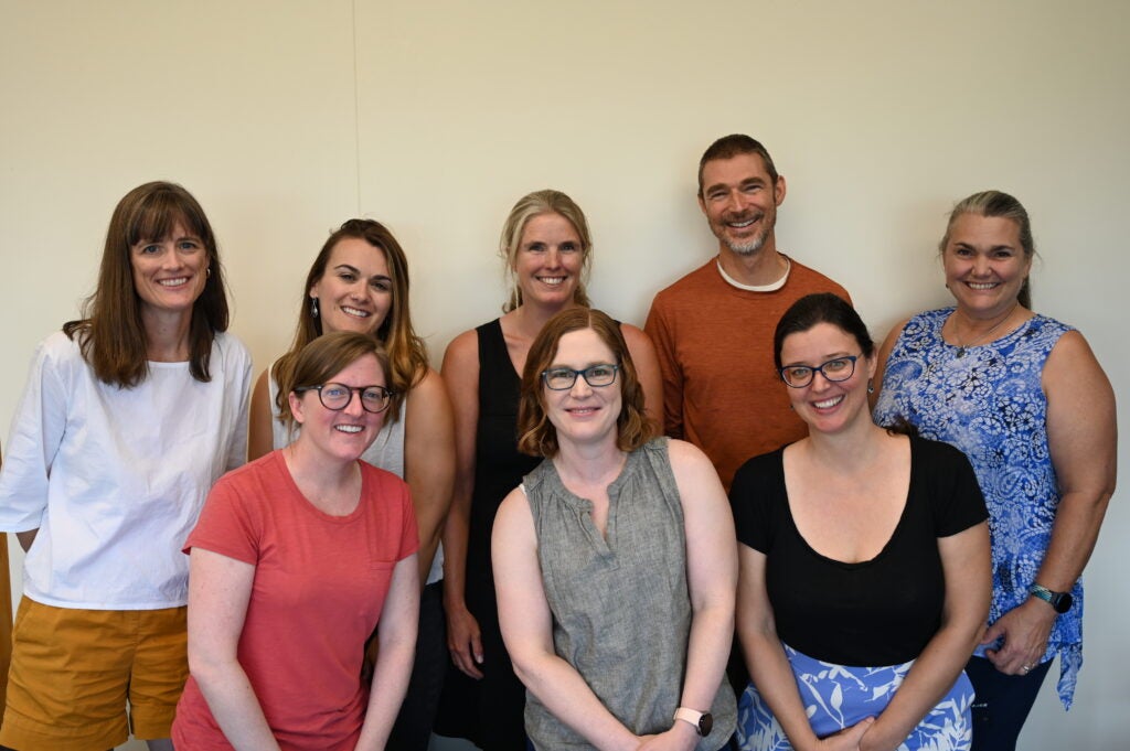 Group photo of eight people