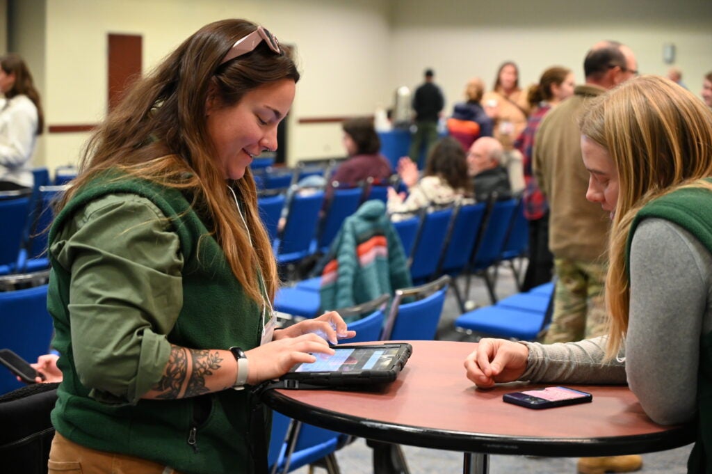 Two conservation experts at a table