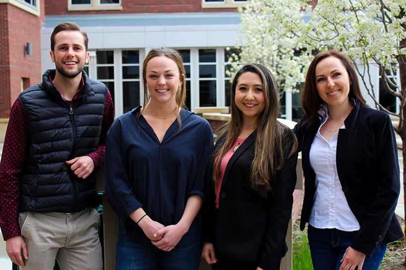 MBA students pose for capstone project