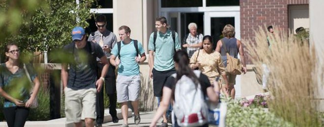 campus scene of students outside COBE