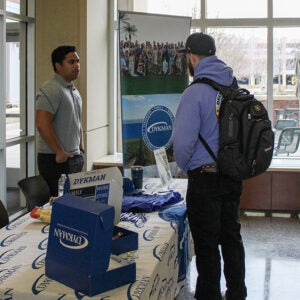 Dykman Electric table at a sales career fair at Boise State