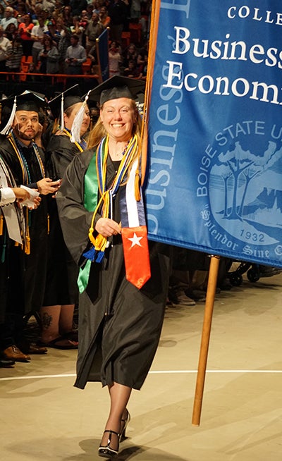 Jennifer Moore Boise State College of Business and Economics 2016 Spring Commencement banner marshal