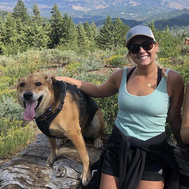 Tara with her dog on a hike at Bogus Basin