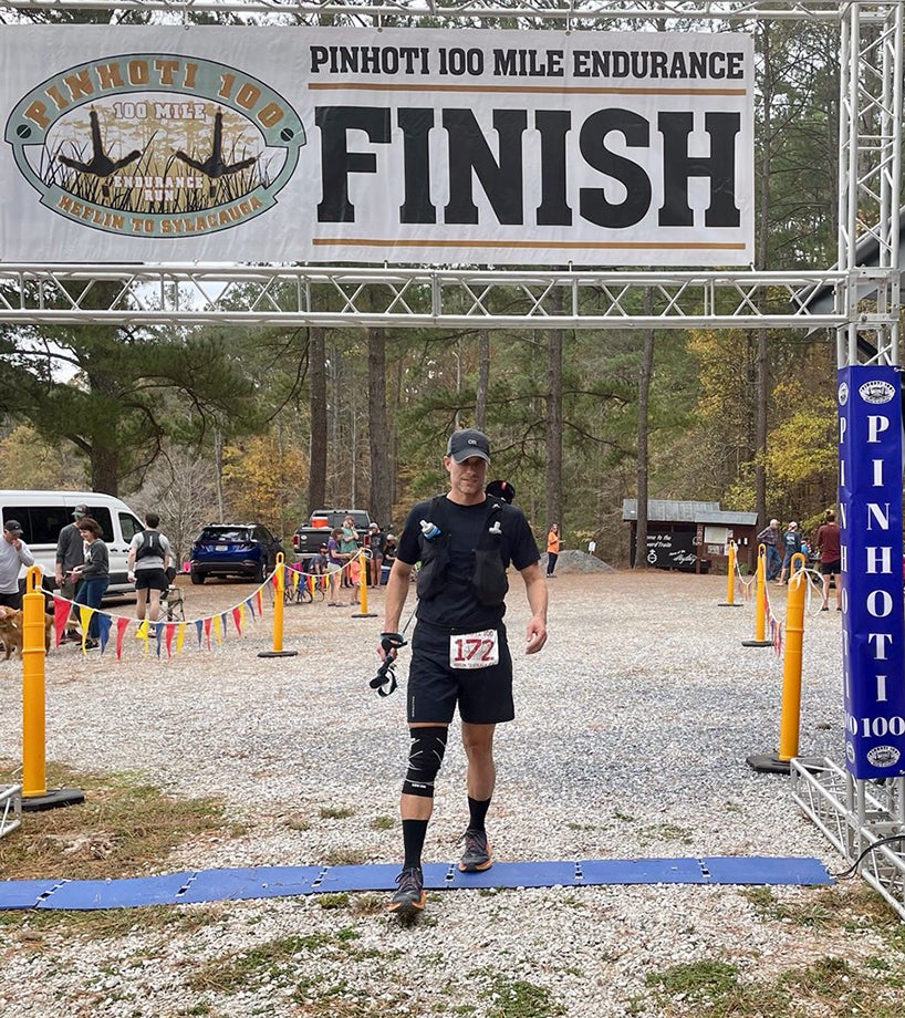 Matt Stallings at the finish line of the Pinhoti 100 mile endurance race