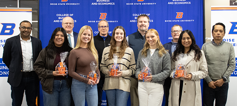 outstanding graduates with their honored faculty