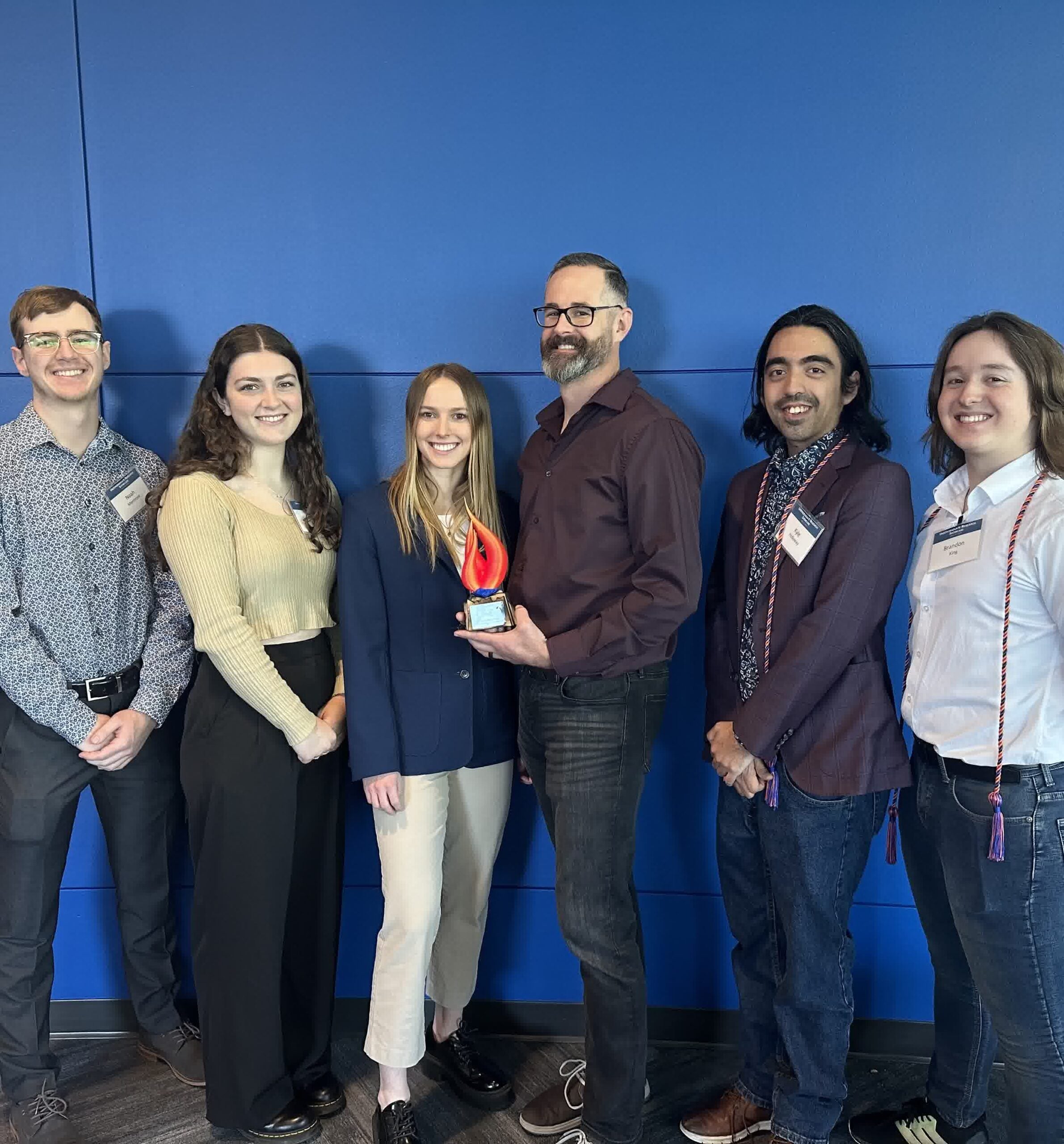 Dr. Jaques with AML undergraduate researchers after receiving the Mentor of the Year Award