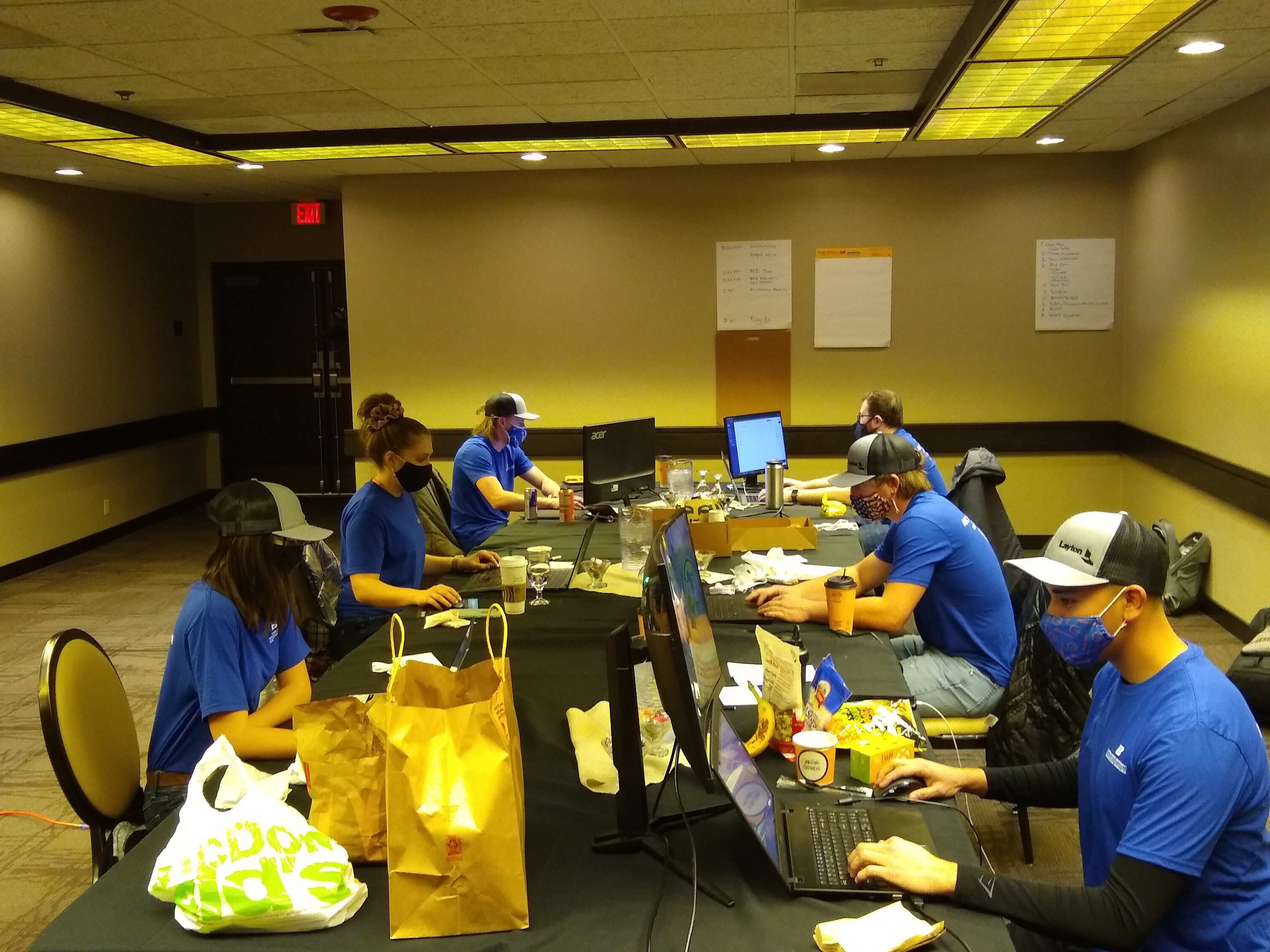 Students working in classroom while wearing face masks