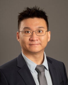 Studio headshot of Dr. Jianshu Liu