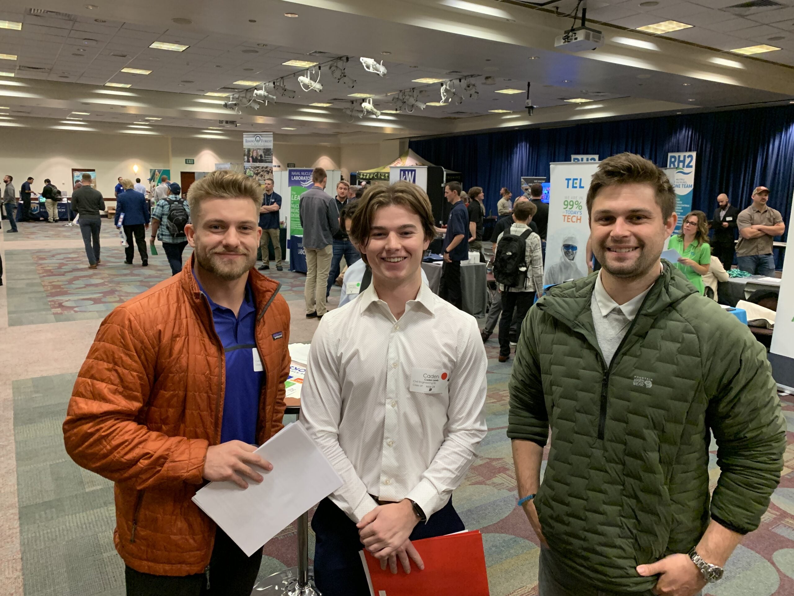 3 people at a career fair