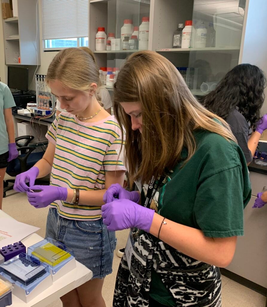 middle school students in lab