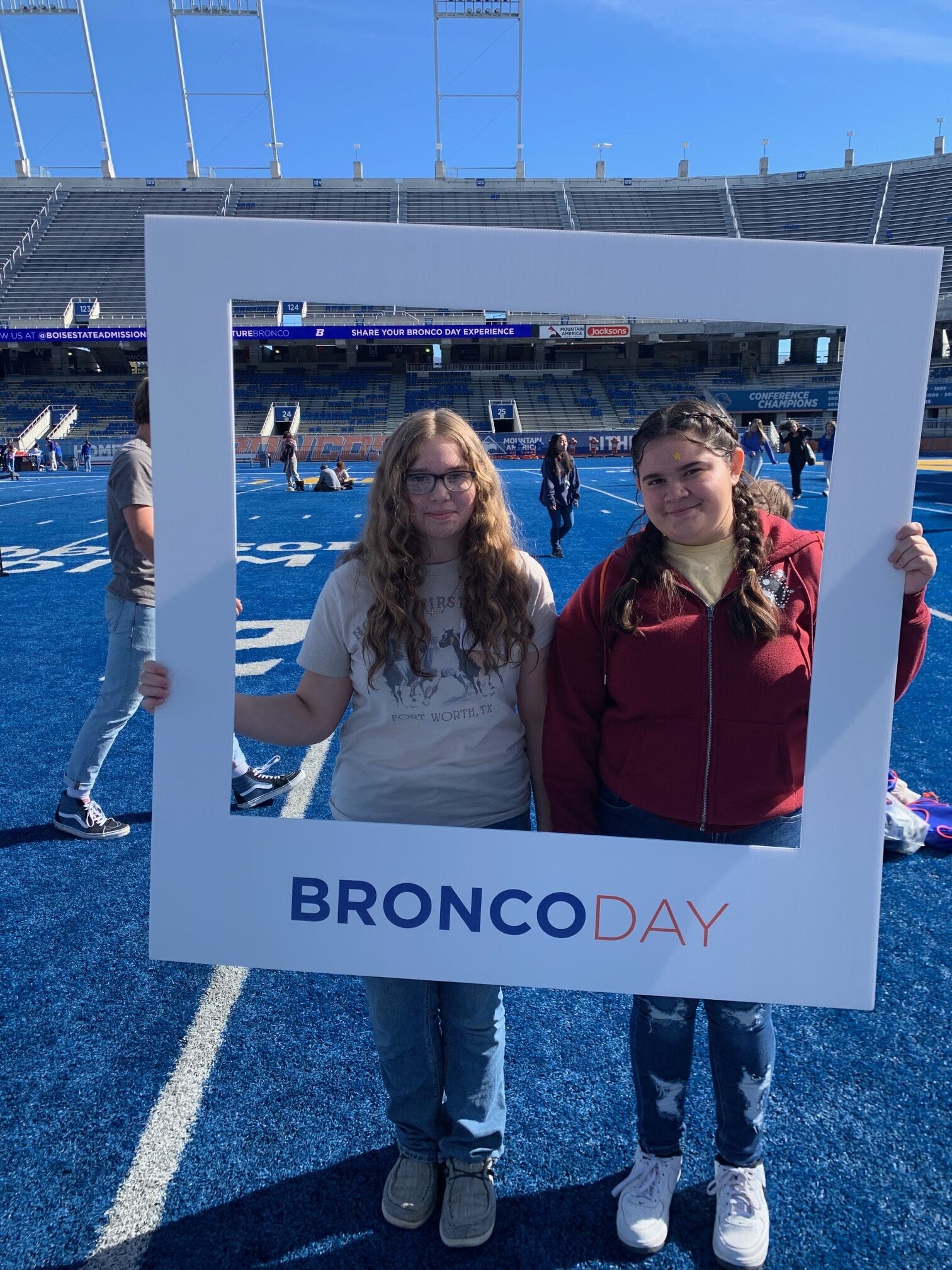 TRIO ETS Students on the Blue turf at Bronco Stadium.