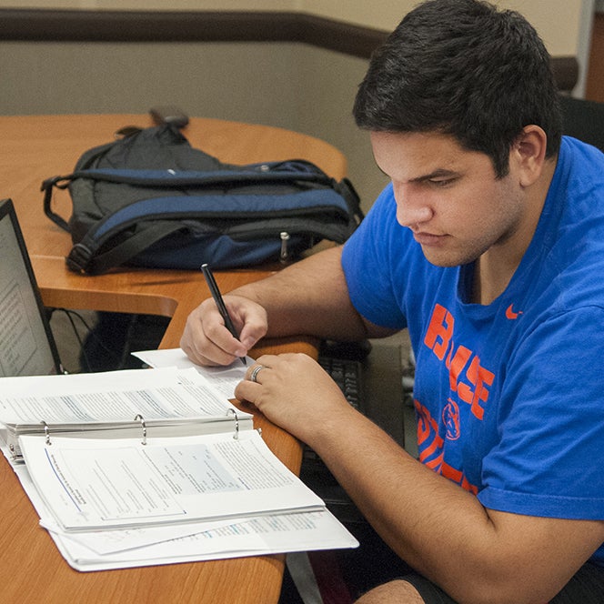 Student studying at a desk