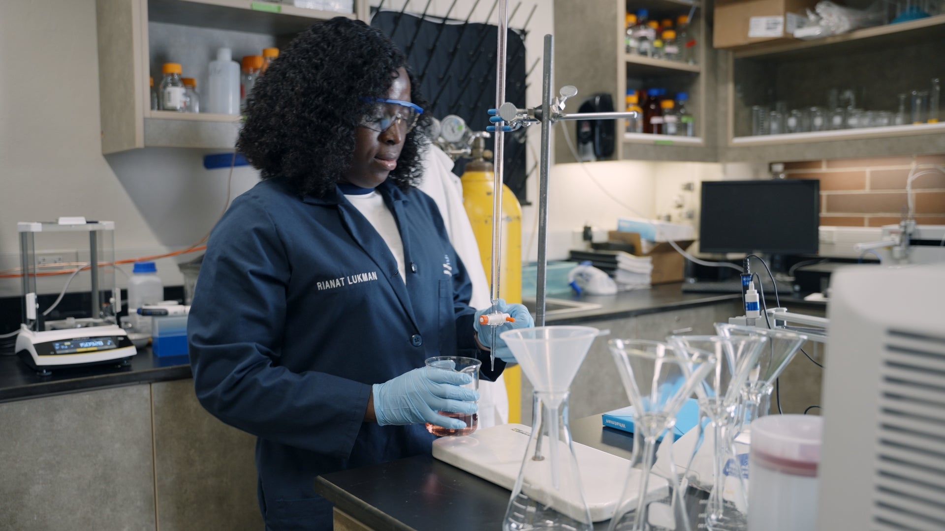 Rianat Lukman working in the lab