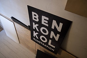 Sign with black backgroud and bold white all caps text that says Ben Konkol illustration