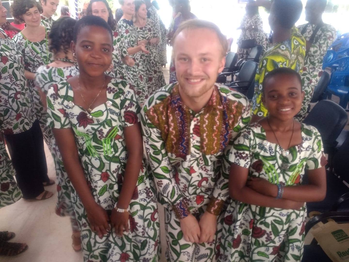 Nathan Schneider with students in Benin