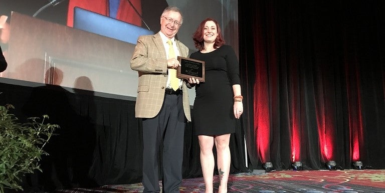 Richard Riegleman presents the Riegleman Award for Guided Learning Pathways to Rhonna Krouse, who accepted the award on behalf of the College of Western Idaho (CWI). Photo courtesy of the League for Innovation in the Community College.