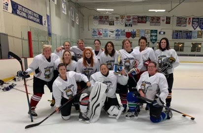Lynda Ransdell's hockey team, the Hurl Scouts, in October 2019 after winning the Upper C Division in the Boise Harvest Classic