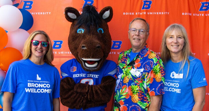 Jo Powers, incoming College of Health Sciences dean, with Buster Bronco, outgoing College of Health Sciences dean Tim Dunnagan, and associate dean Lutana Haan at the annual Bronco Welcome picnic for Health Sciences students.