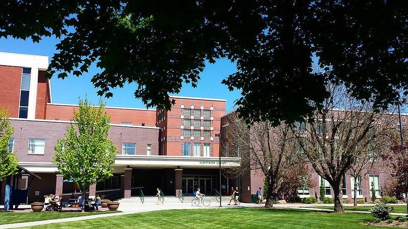 Color photo of library building façade on a sunny day