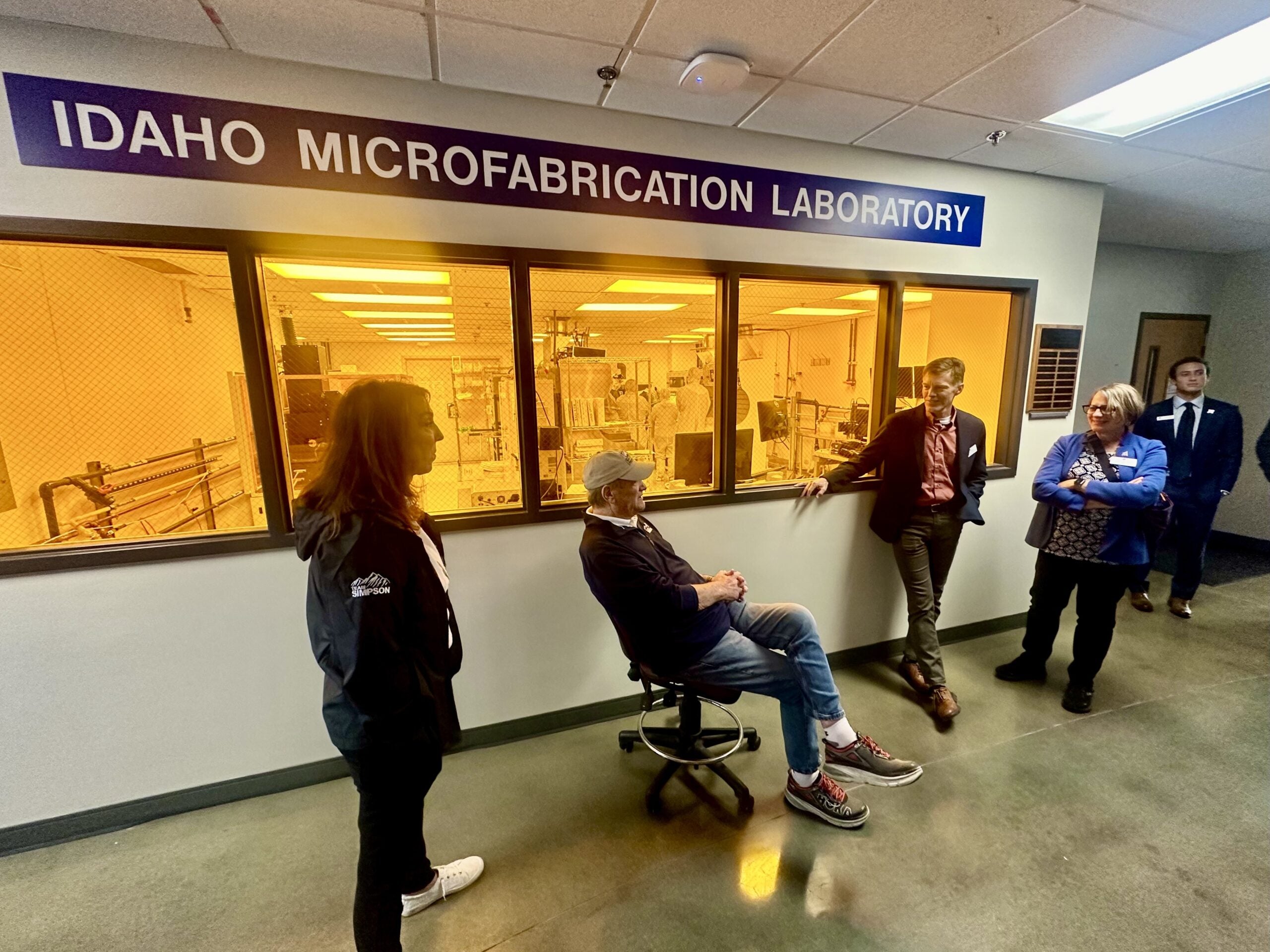 Five people standing outside of the Idaho Microfabrication Laboratory