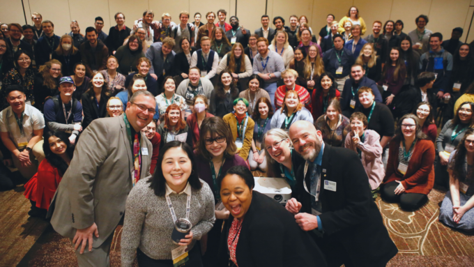 Group shot of collegiate meet and greet at music education conference.