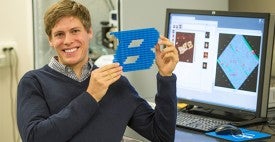 Kelly Schutt with 3-d printed b logo