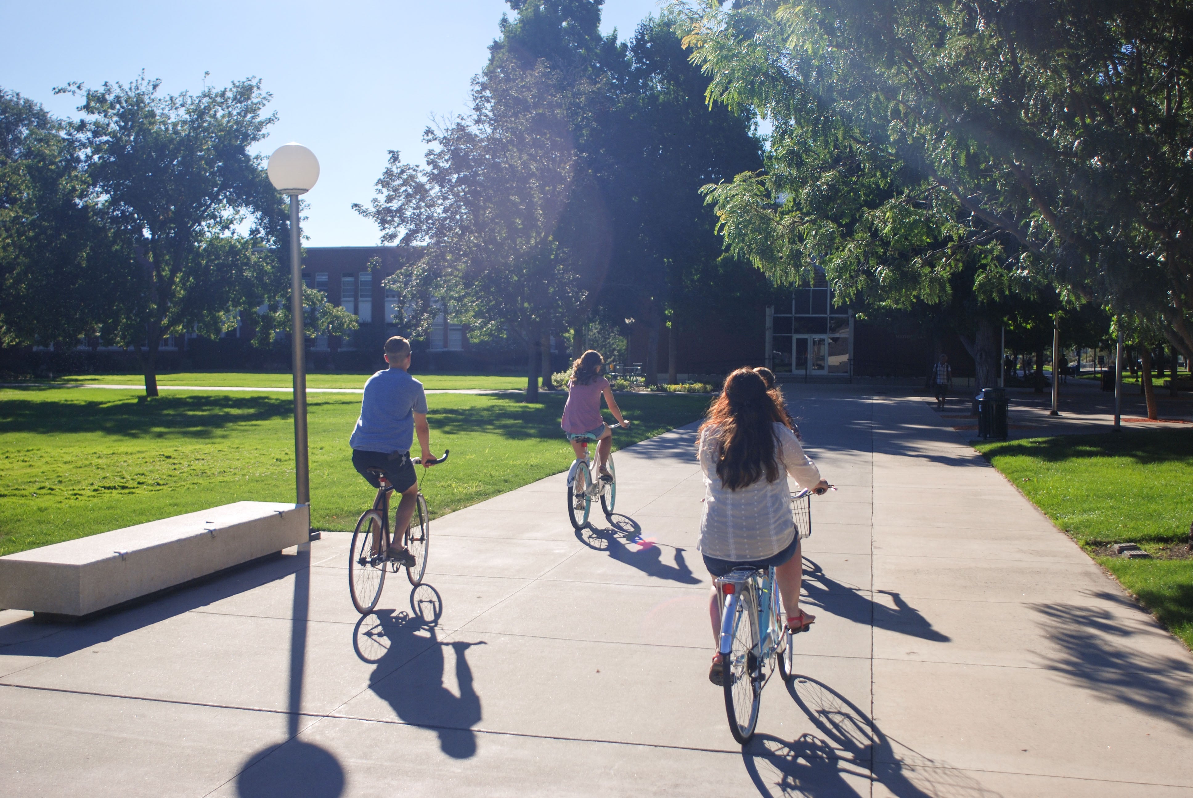 Photo of a campus tour biking through campus.