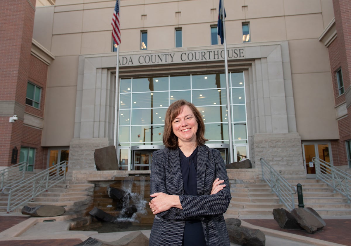 Alumna Shawna Dunn in front of the Ada County Courthouse