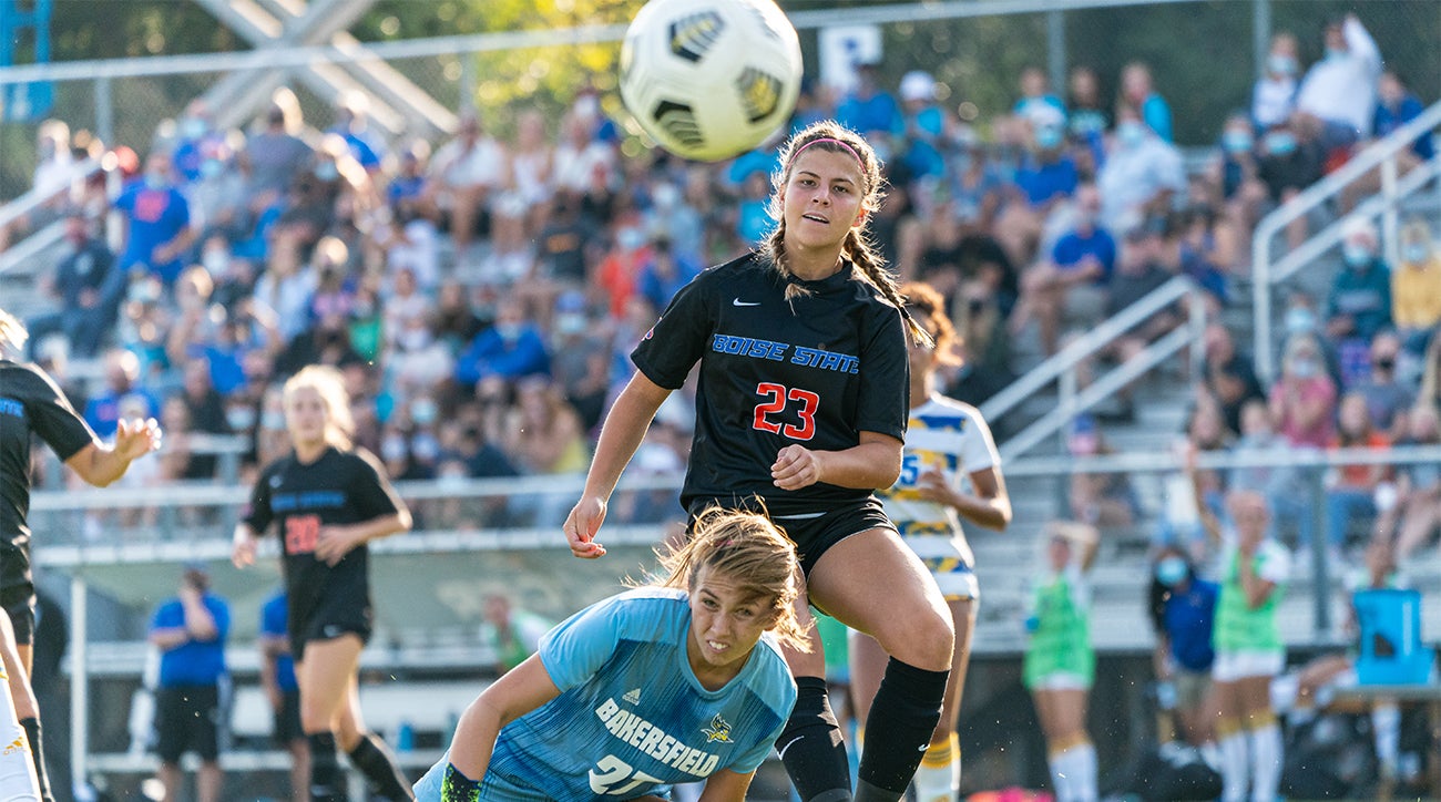 Soccer playing running towards ball in a match between Bakersfield and Boise State