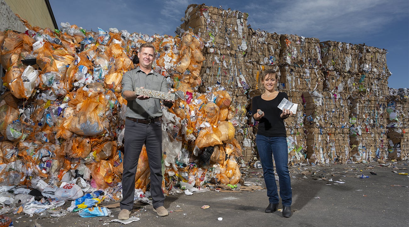 researchers at recycling center