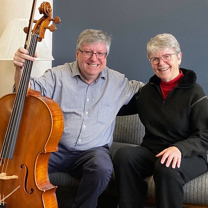 Craig Purdy, professor of violin and director of orchestras for the Boise State Department of Music along with Patricia Young who donated a cello to the Boise State Chamber Music Society for student use in the music department.