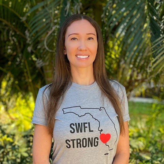 Jovita Gardner in a shirt that reads SWFL Strong with an outline of Florida