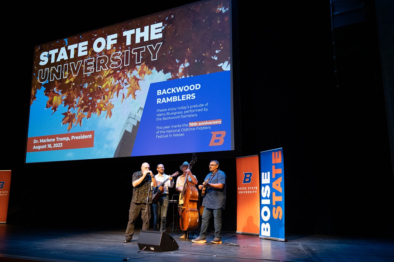 The Backwood Ramblers band performing on stage the the State of the University.