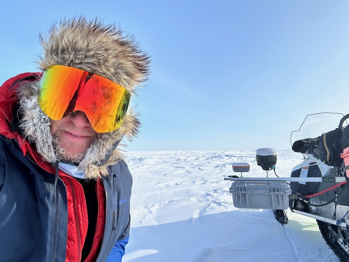 Boise State Professor Hans-Peter Marshall in the Arctic studying ice depth.